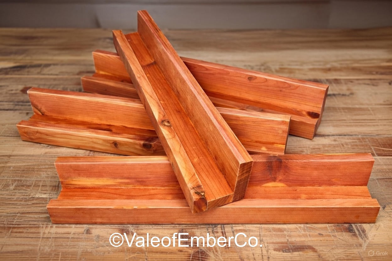 Stack of wooden planks on a wooden surface with 'ValeofEmberCo' branding. Domino/Scrabble Holder